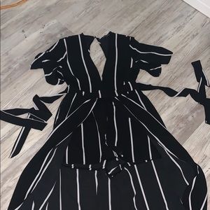 A romper with a flow back
